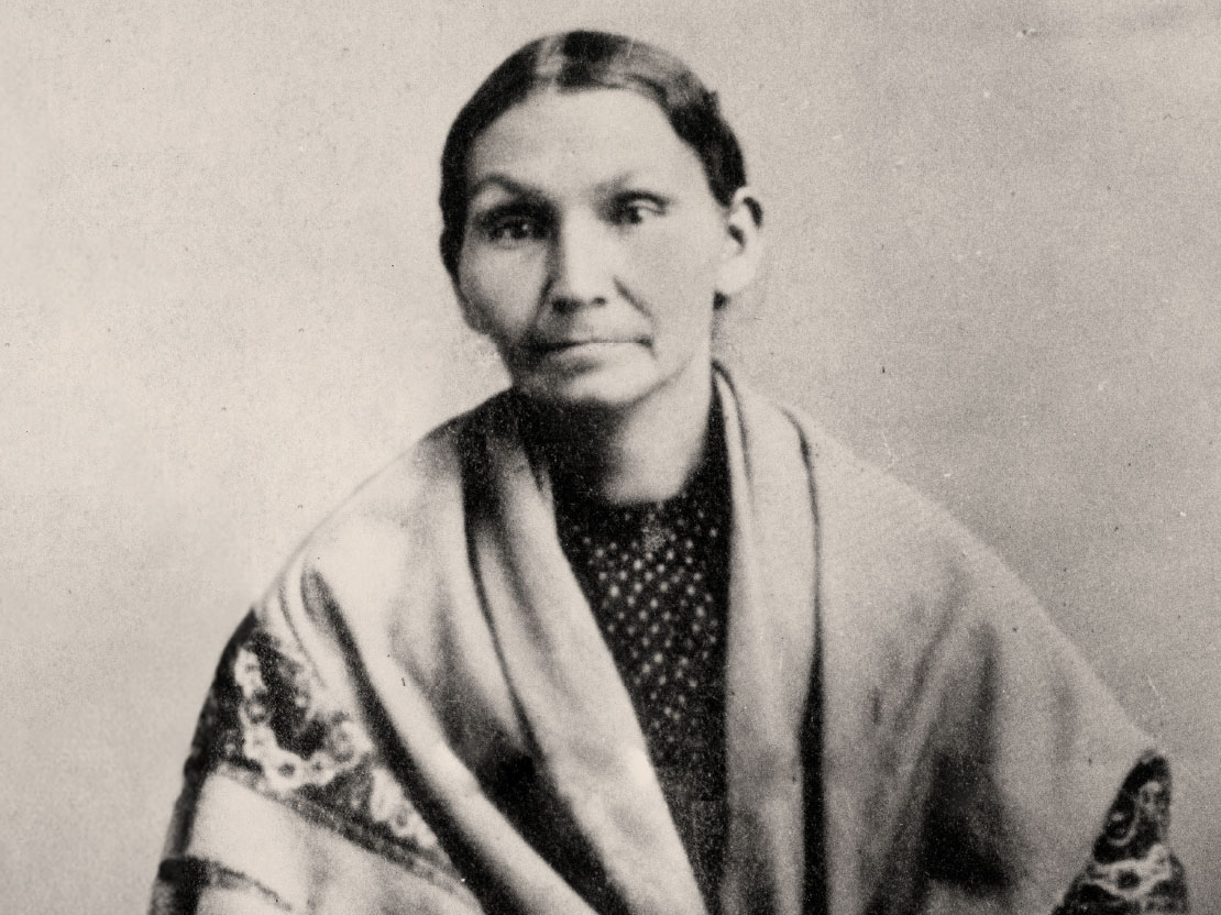 A black and white photograph of Electa Quinney. She is wearing a shawl and facing toward the camera.